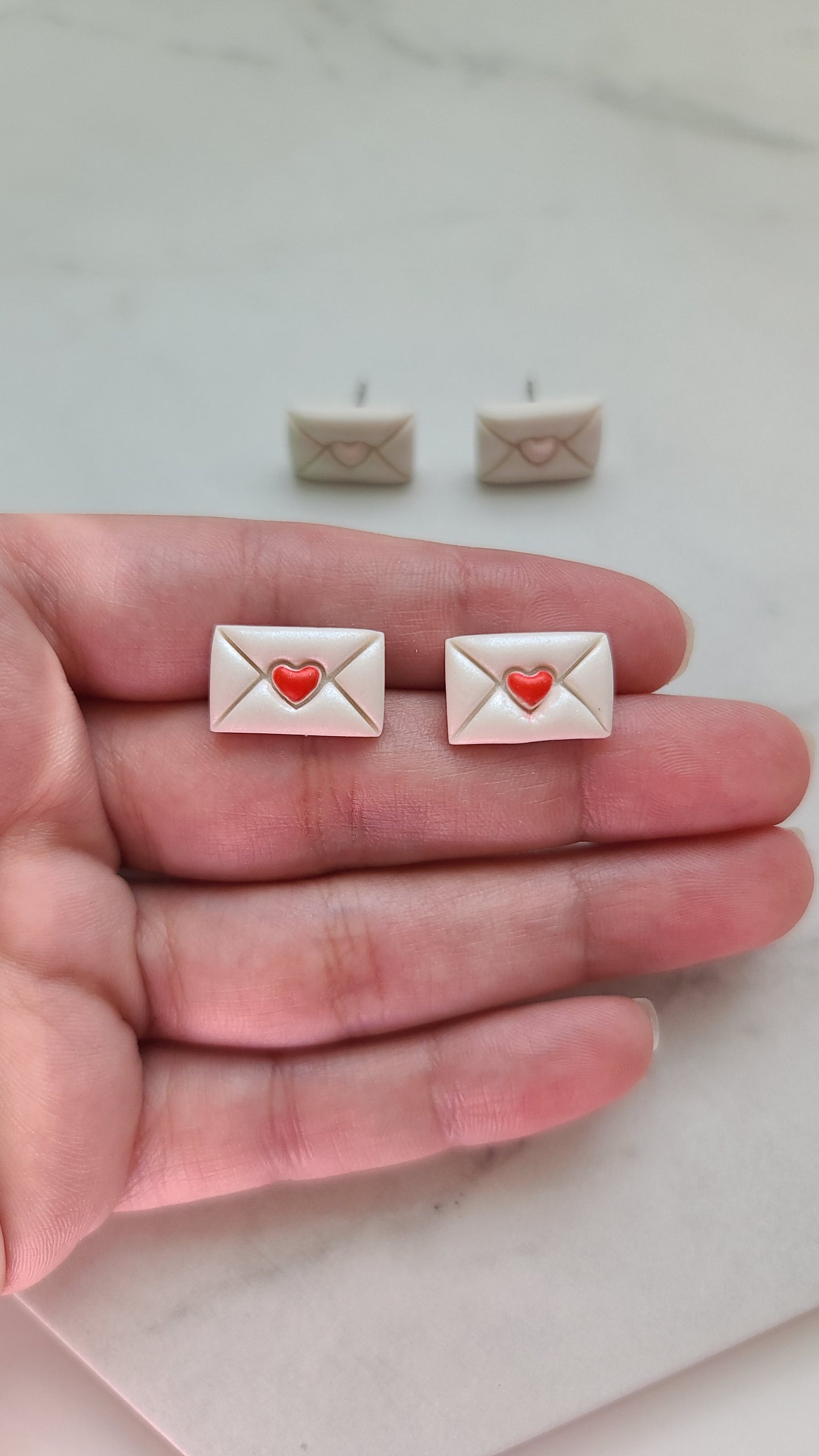 Envelope with heart studs earrings