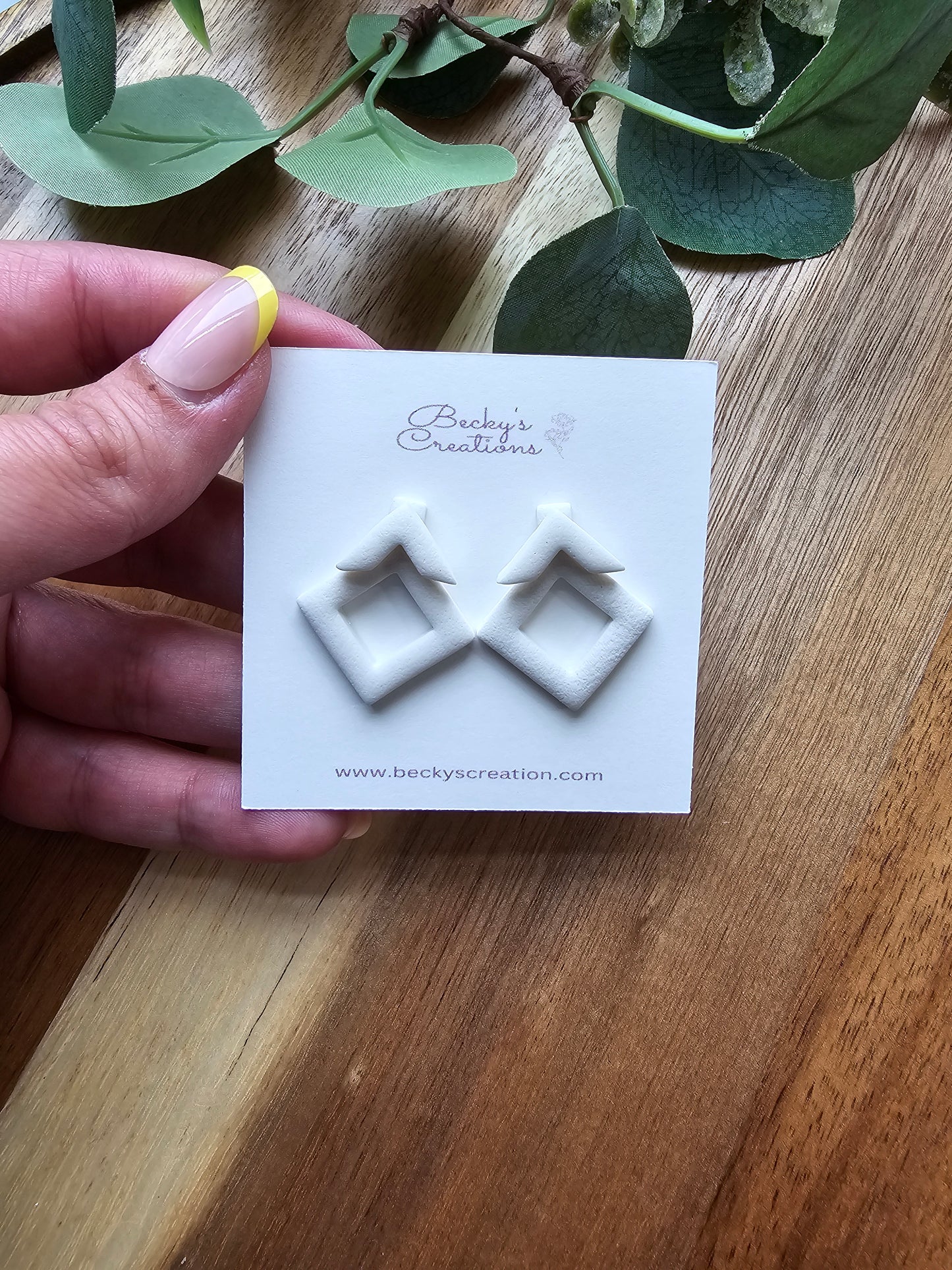 Diamond shape ear jacket earrings