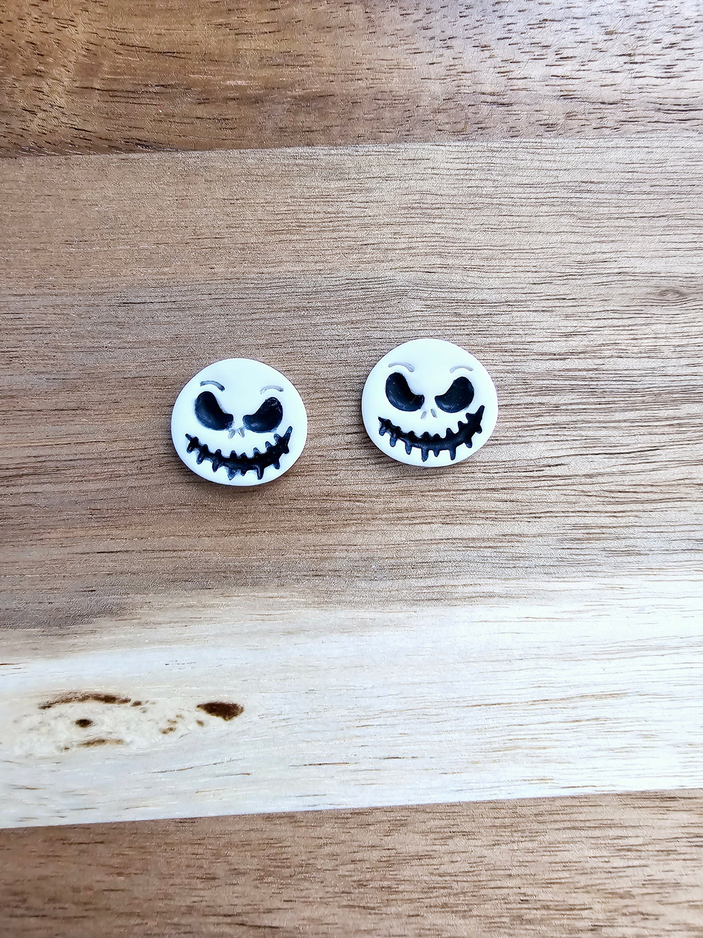 Skeleton stud earrings