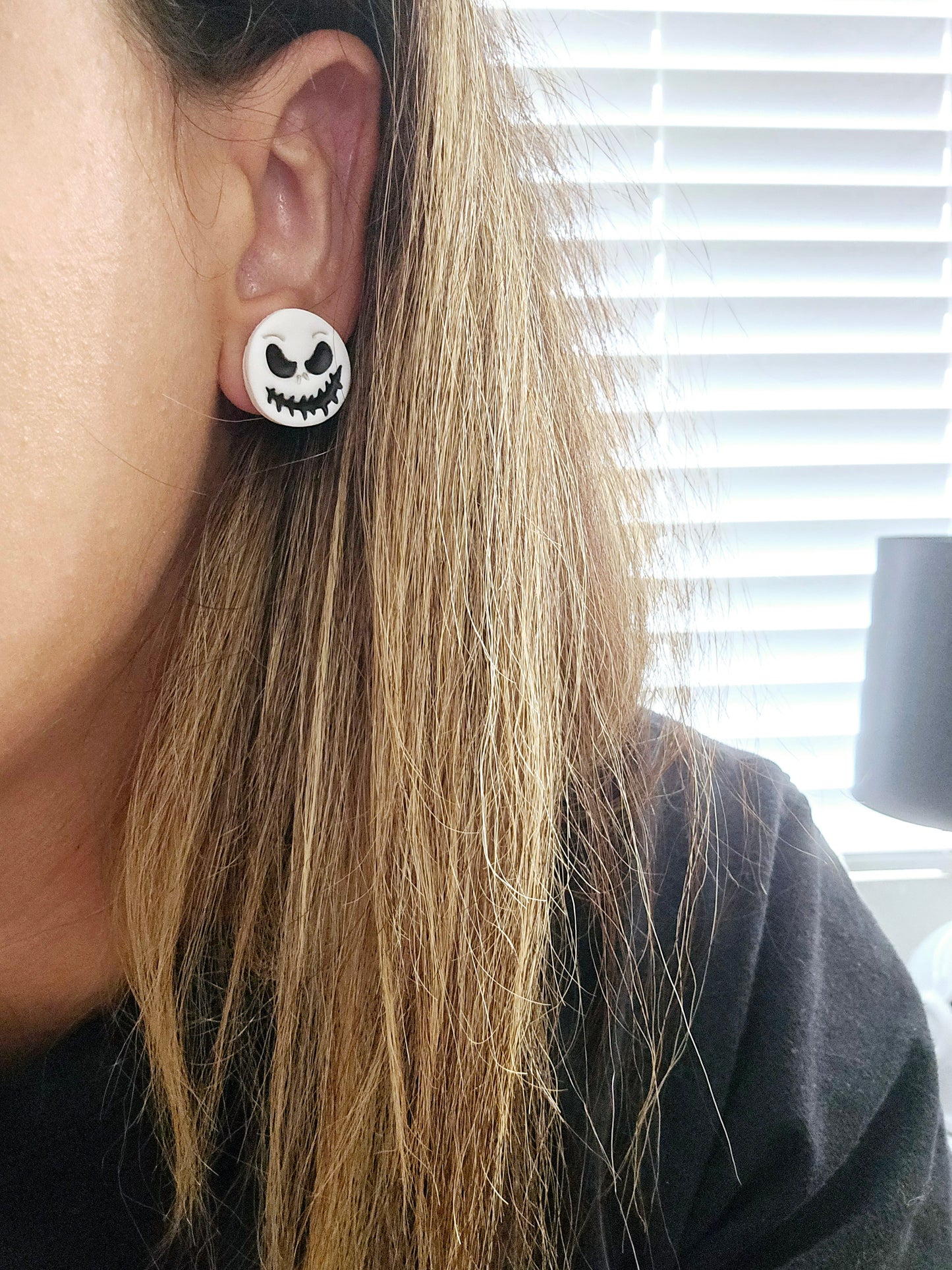 Skeleton stud earrings