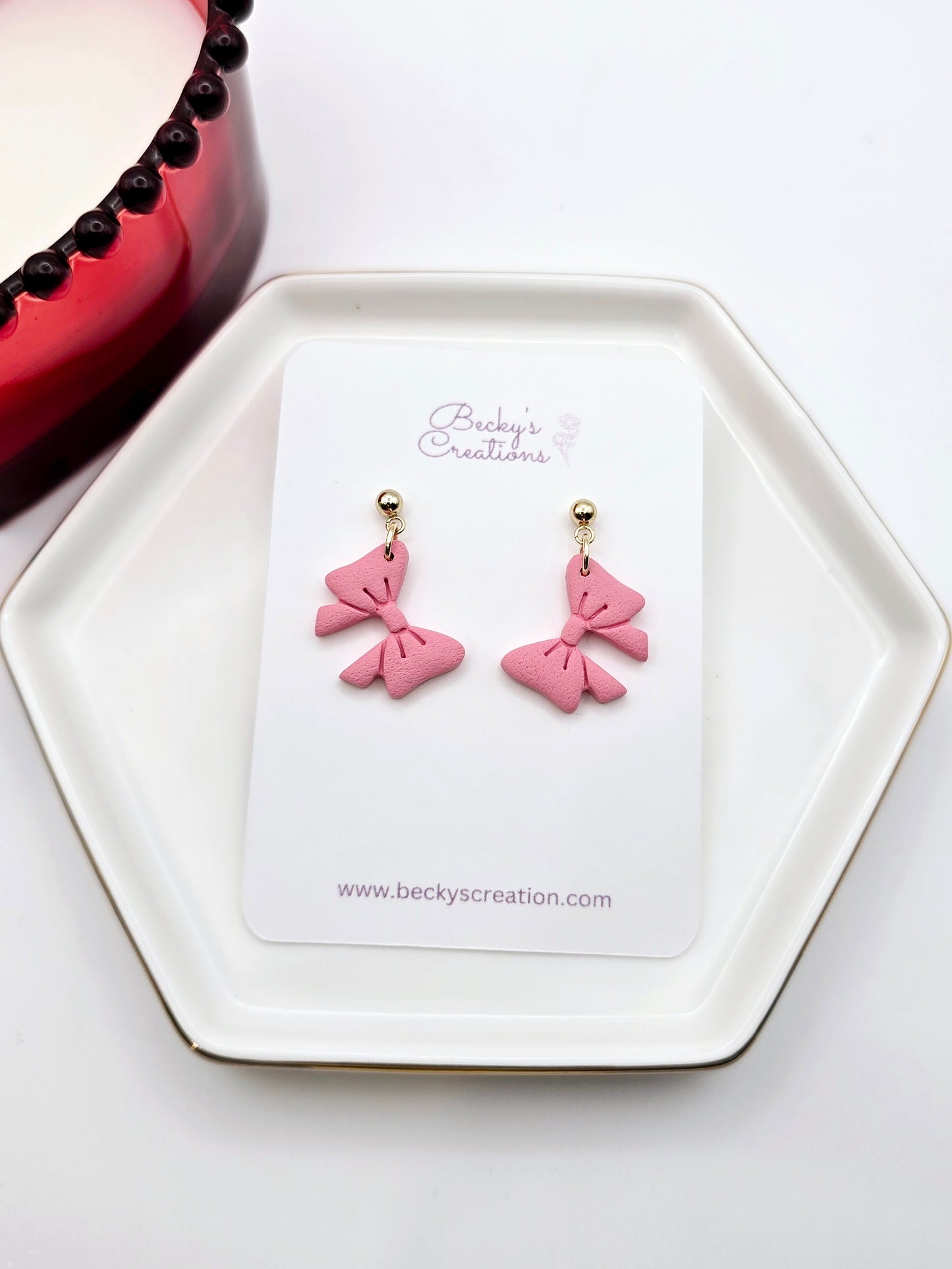 Sideways bow earrings