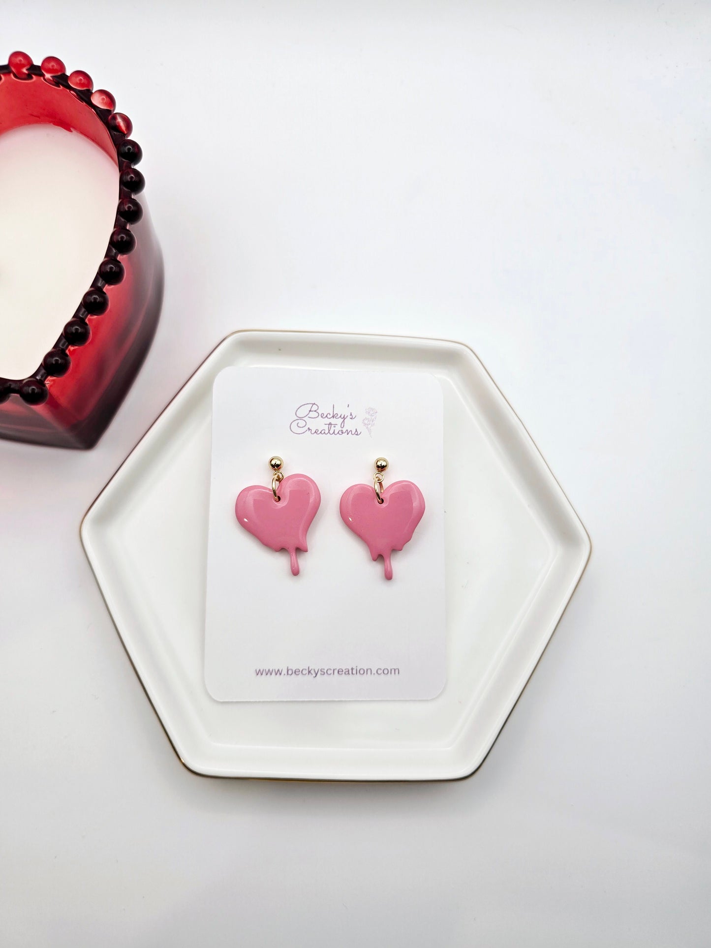 Melting heart dangle earrings