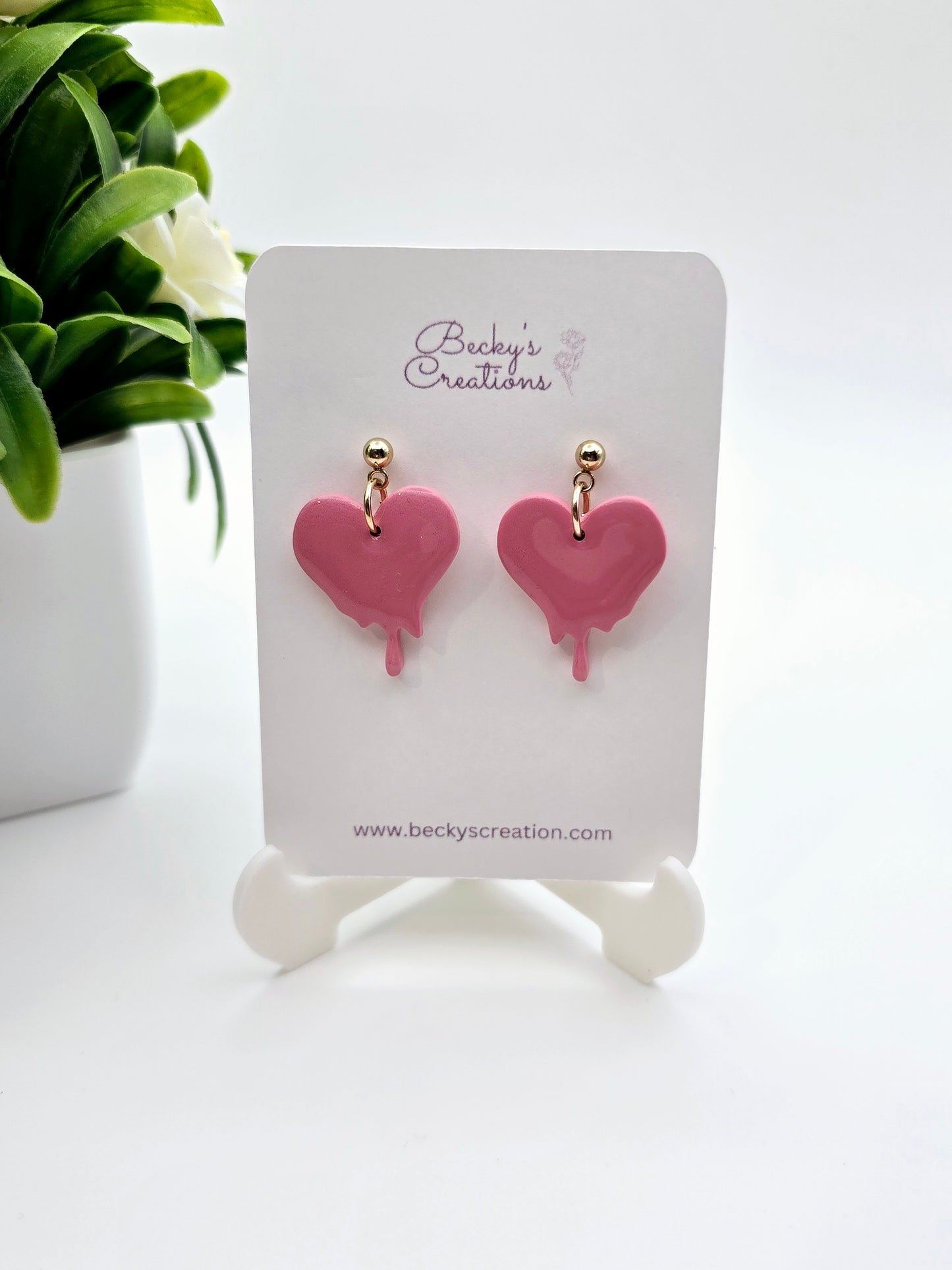 Melting heart dangle earrings