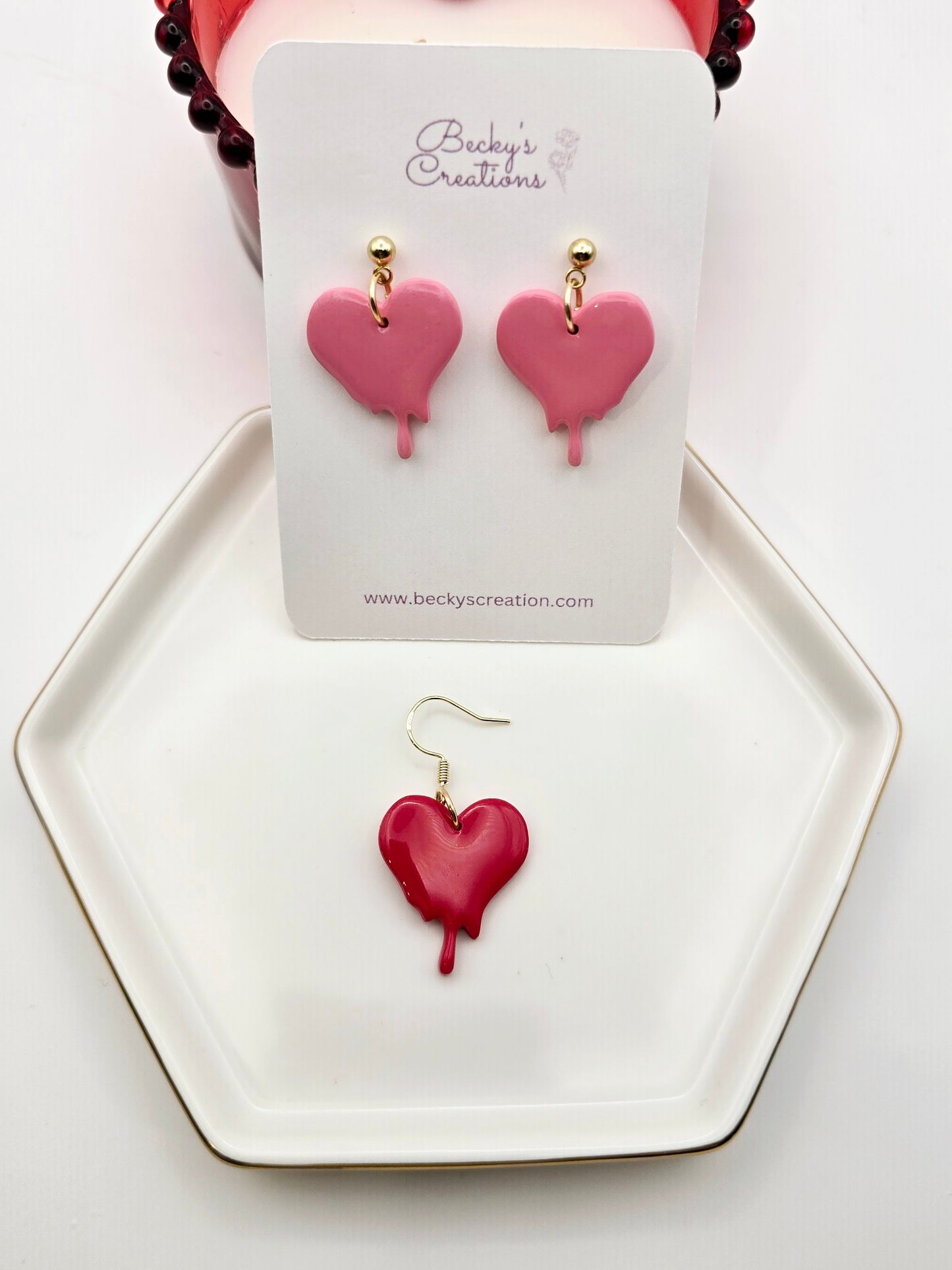 Melting heart dangle earrings