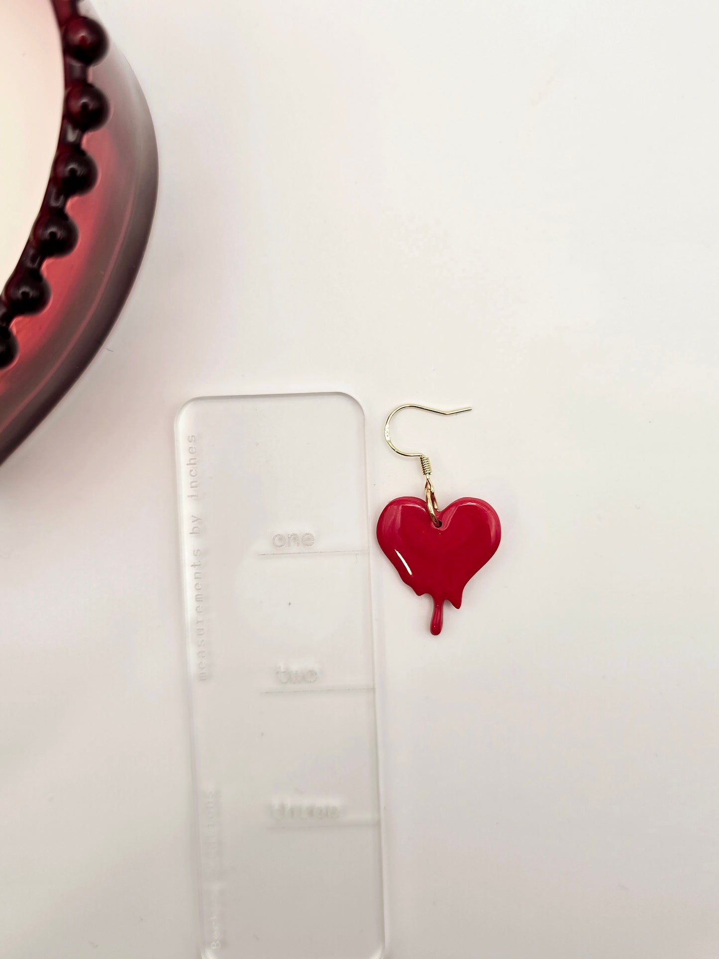 Melting heart dangle earrings