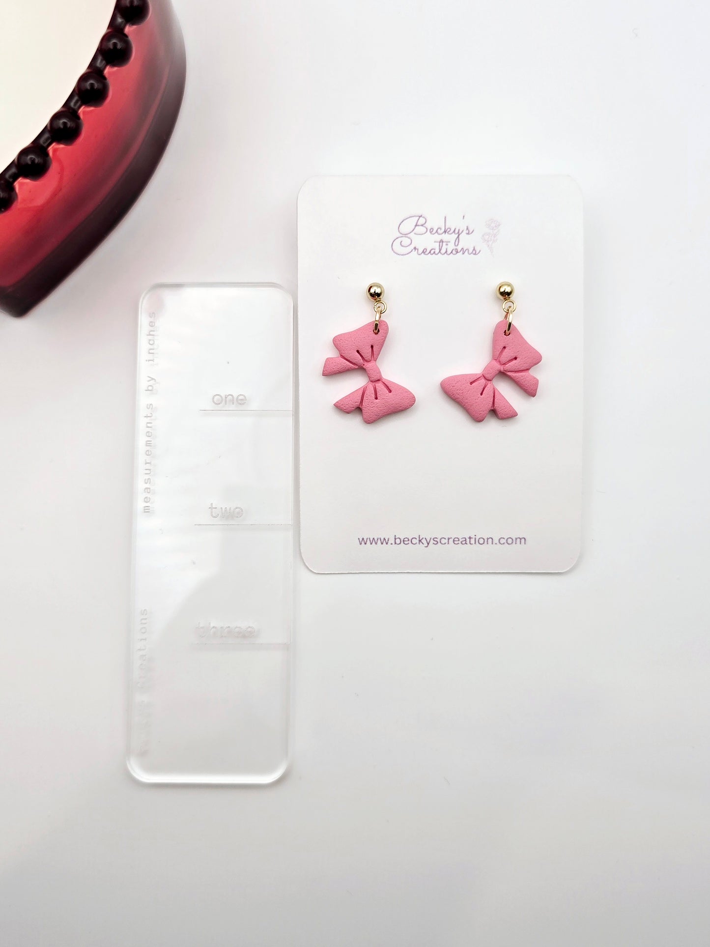 Sideways bow earrings